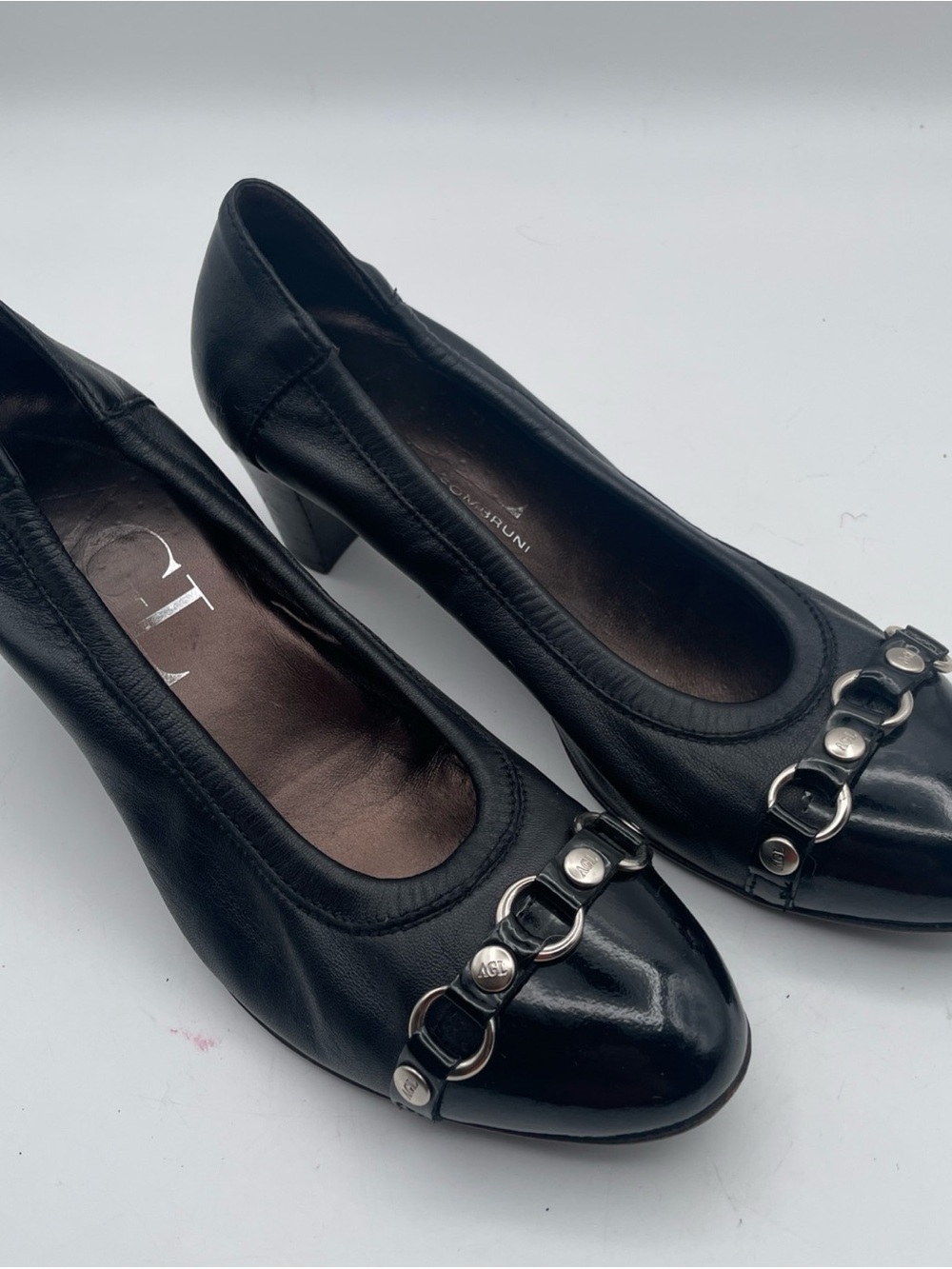 AGL Black Leather Cap Toe Mid Heel Pumps with Silver Chain Accent